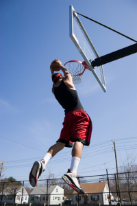 Man Dunking the Basketball