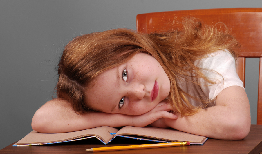 Girl Laying Down Head On Desk Men In The Head